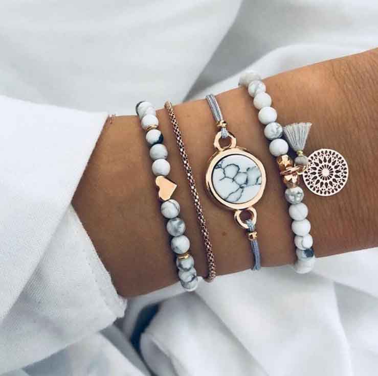 Conjunto de pulseras con piedra de pino con flecos huecos