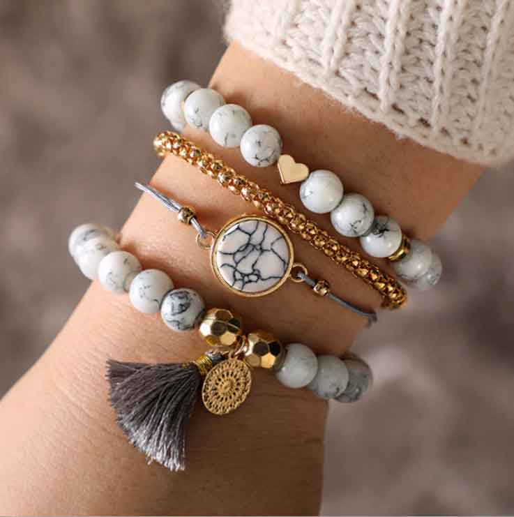 Conjunto de pulseras con piedra de pino con flecos huecos