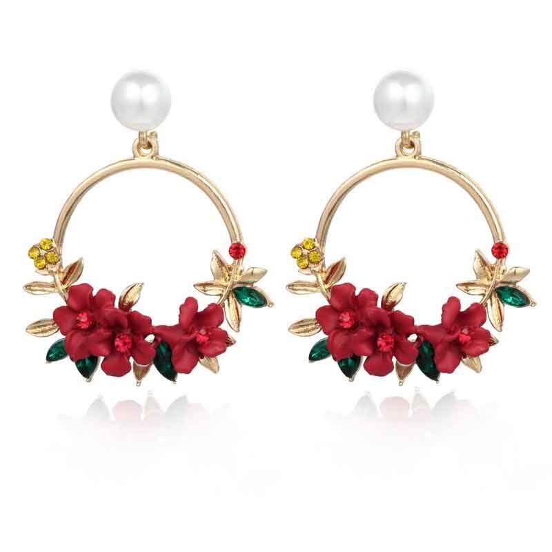 Pendientes circulares de ratán con flores