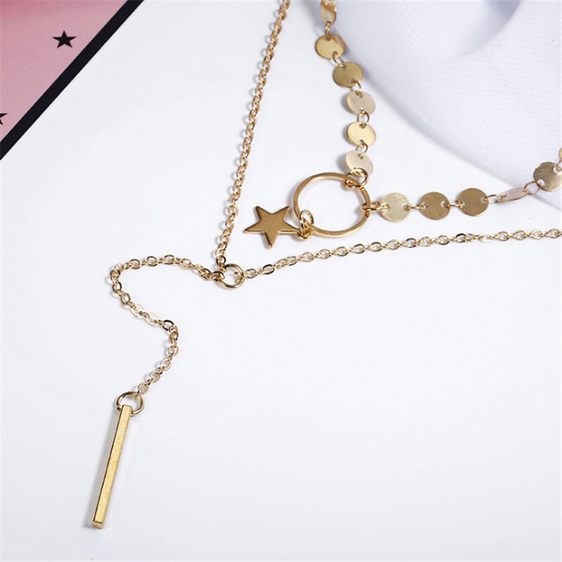 Collar de estrellas con circulo colgante