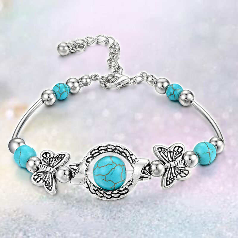 Pulsera con mariposas turquesa y piedra natural