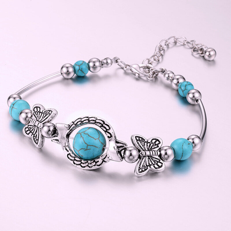 Pulsera con mariposas turquesa y piedra natural