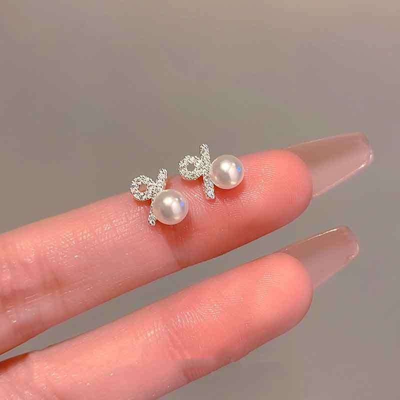 Pendientes de botón de perla con símbolo de porcentaje y aguja de plata